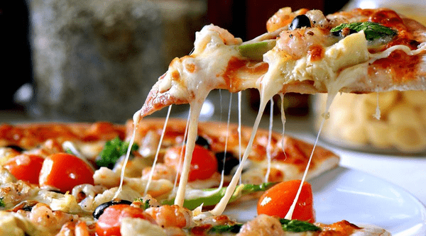 Buy 5 Domino's Onion or Tomato Pizza @ Rs.105